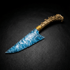 Stoneblade Forge hand-knapped blue opalite crystal dagger with natural antler handle on black textured background
