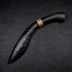 Stoneblade Forge hand-knapped black obsidian kukri with curved dark wooden handle on black textured background
