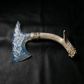 Transparent opal Axe Stone Blade Moonveil with antler handle on black leather background