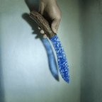 Claw Stone Blade — Abysscrest (Ocean Blue, Crystal), hand-held curved blade showing full arc profile