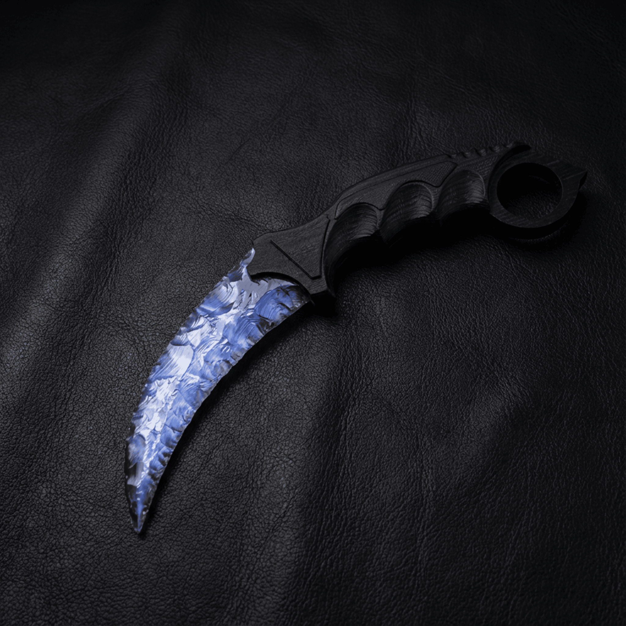 Blue crystal claw stone blade on black leather background, top view