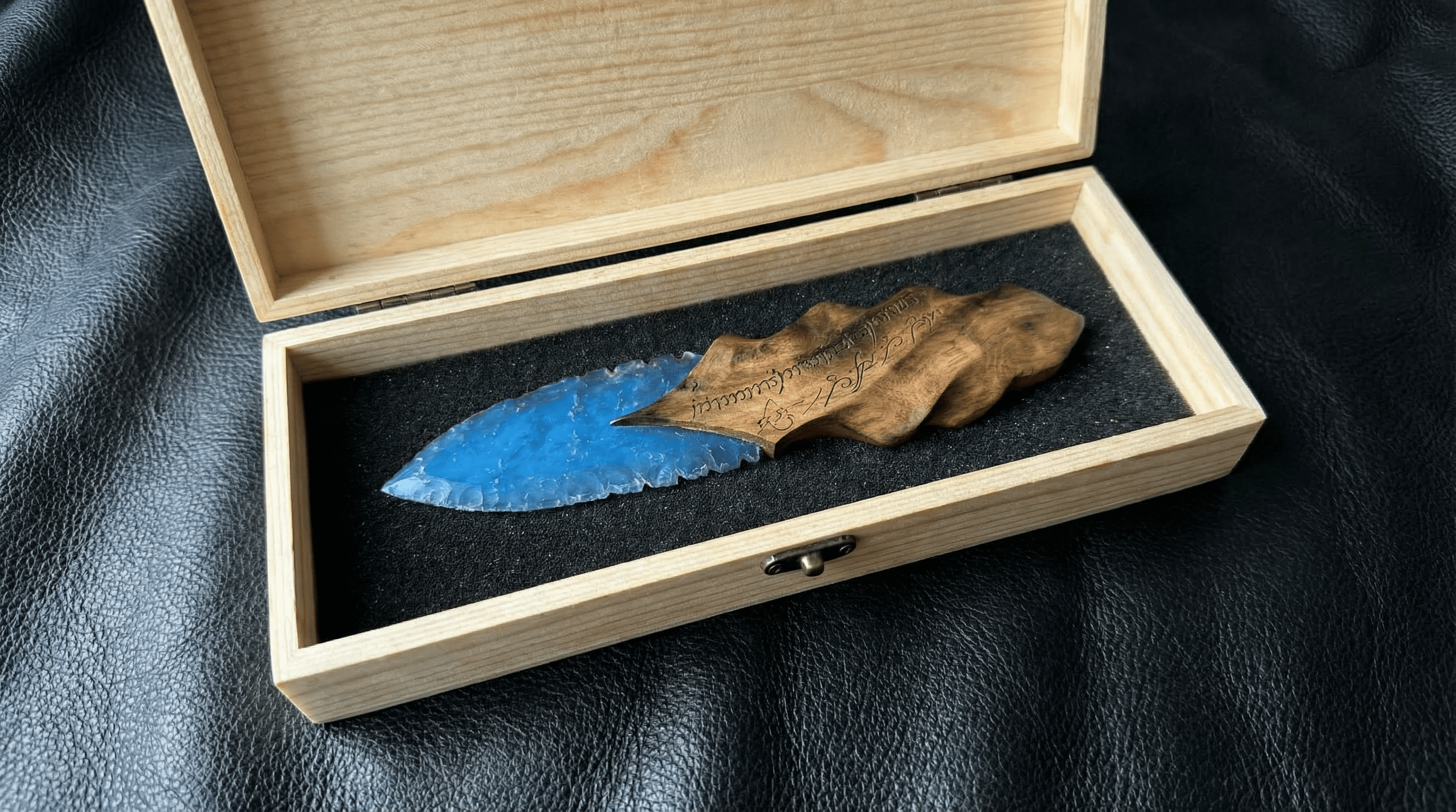 Stoneblade Forge Dagger Stone Blade “Oblivion” featured banner—blue knapped-style dagger with carved wood handle presented in an open wooden gift box on black leather.