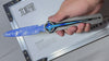 Stoneblade Forge Delta Force variant video showcasing Polaris, Mercy, and Creed crystal collector knives in hand against display frame backgrounds